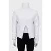 White sweater with a slit in the middle