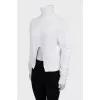 White sweater with a slit in the middle