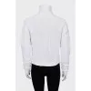 White sweater with a slit in the middle