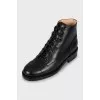 Leather boots with signature logo