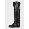 Leather boots decorated with buckle