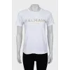 T-shirt with gold logo