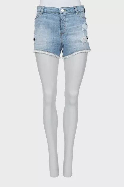Blue denim shorts with ripped effect