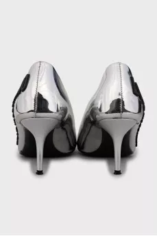 Silver shoes with brand logo