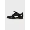 Leather brogues with pointed toe
