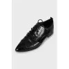 Leather brogues with pointed toe