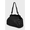 Crossbody bag with embossed leather