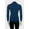 Blue golf with seams facing out