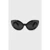 Black sunglasses decorated with rhinestones