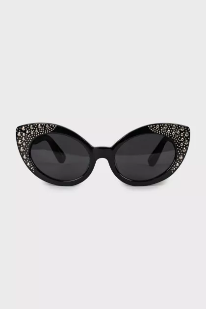 Black sunglasses decorated with rhinestones