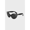 Black sunglasses decorated with rhinestones