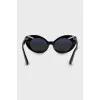 Black sunglasses decorated with rhinestones