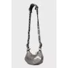 Silver bag with hanging mirror