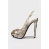 Leather sandals with perforations