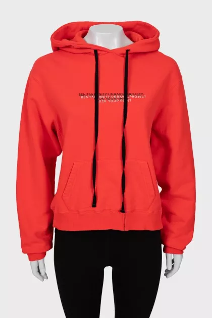 Red hoodie with slogan print
