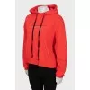 Red hoodie with slogan print
