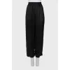 Elastic trousers with lurex