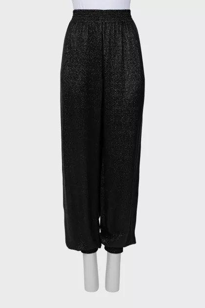 Elastic trousers with lurex