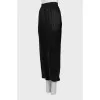 Elastic trousers with lurex