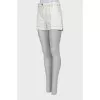 White denim shorts with patches