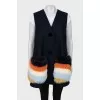 Blue vest with fur pockets