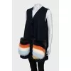 Blue vest with fur pockets