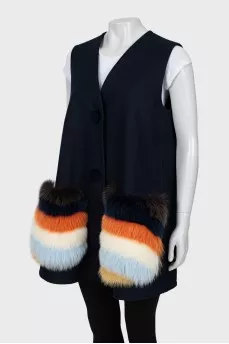 Blue vest with fur pockets
