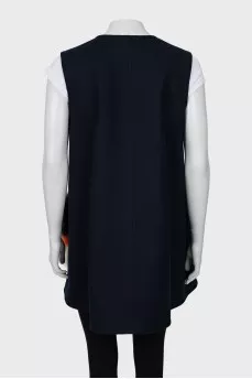 Blue vest with fur pockets