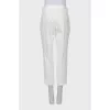 White trousers with stitched creases