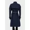 Dark blue cloak at the waist