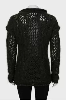 Knitted sweater decorated with rhinestones