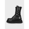 Black leather high boots