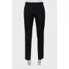 Men's black trousers with arrows