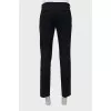 Men's black trousers with arrows