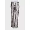 Animal print track pants