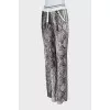 Animal print track pants