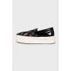 Leather slip-ons with embroidery