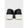 Leather slip-ons with embroidery