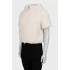 Beige down jacket with short sleeves