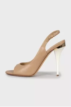 Leather sandals with metal inserts