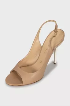 Leather sandals with metal inserts