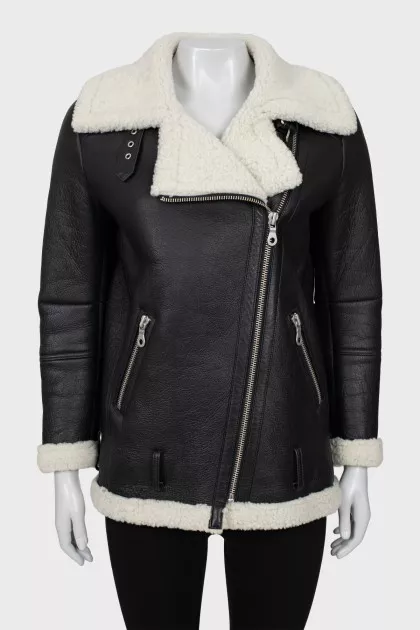 Leather coat with oblique zipper