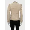 Light green jacket with tag