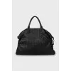 Woven leather travel bag
