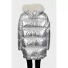 Silver down jacket with fur on the hood