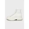 White leather boots with chunky soles