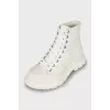 White leather boots with chunky soles