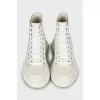 White leather boots with chunky soles