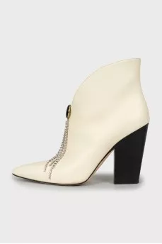 Leather ankle boots with removable decoration