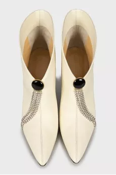 Leather ankle boots with removable decoration